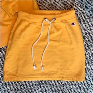 Champion gold mini skirt